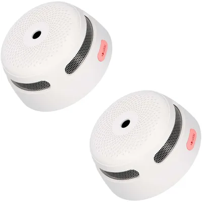 Two white smoke detectors are shown against a white background.