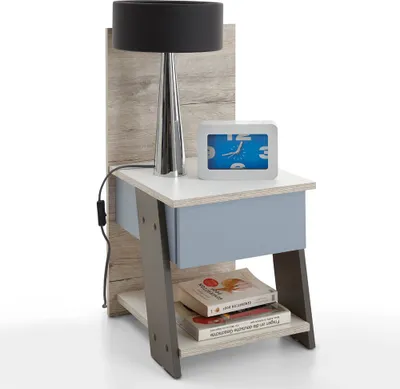 A modern nightstand with a lamp and an alarm clock.