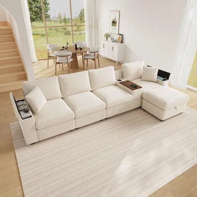 Immagine prodotto di Divano componibile a forma di L con poggiapiedi, spazio contenitivo, porte USB/Type-C, portabicchieri, tavolino girevole a 360°, spazio contenitivo integrato nelle braccioli (beige)