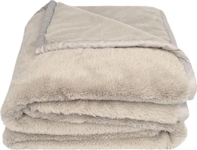 A folded plush blanket.