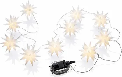 A string of white star-shaped LED lights with a black power adapter.