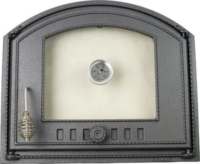 A close-up studio shot of a cast iron oven door with a glass window and a built-in thermometer.