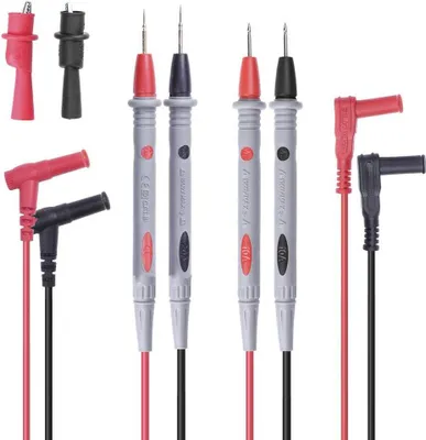 A collection of multimeter test leads and alligator clips arranged on a white background.