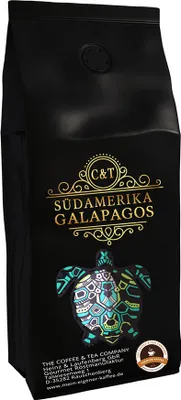 A black coffee bag with gold lettering and a colorful turtle illustration.