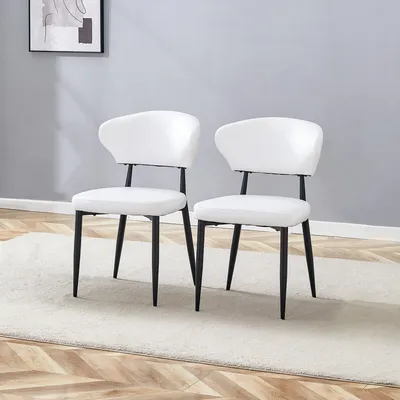 Productafbeelding van Witte, minimalistische, ergonomische eetkamerstoel met gebogen rugleuning, comfortabel in ontwerp – biedt een nieuwe zitpositie vol comfort en eenvoudige elegantie. In een set van 2 stuks. Wit + zwart