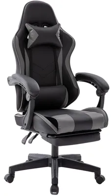 A black and gray gaming chair with a footrest is shown against a white background.