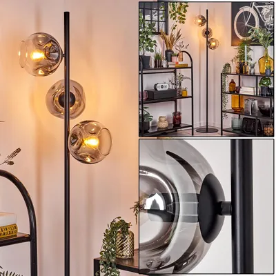 Produktbild von Villamare Stehlampe aus Metall/Glas in Schwarz/Rauchfarben mit Fußschalter