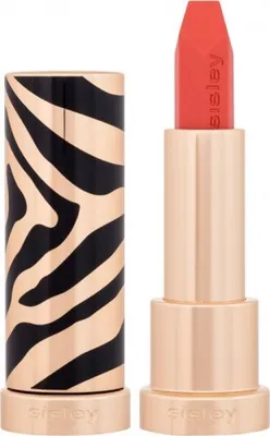 A close-up studio shot of an open lipstick tube with a zebra-print casing.
