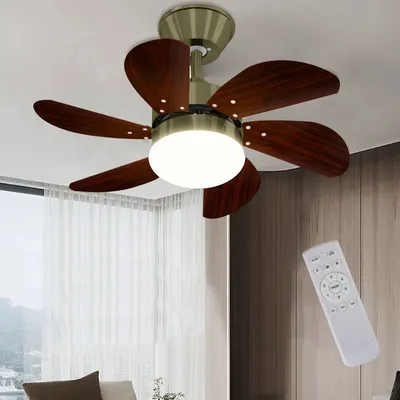 A ceiling fan with lights and a remote control.