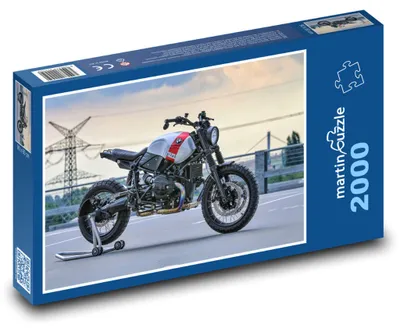 Zdjęcie produktu dla Puzzle 2000 Motocykl na miejskiej drodze - martinpuzzle