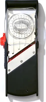 A top-down view of a multi-purpose kitchen slicer.