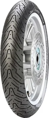 A close-up view of a motorcycle tire mounted on a silver wheel rim, with a visible brake disc.