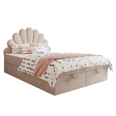 A bed with bedding and pillows, presented against a white background.