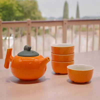 Immagine prodotto di Set da tè - Arancione - Teiera e quattro tazze