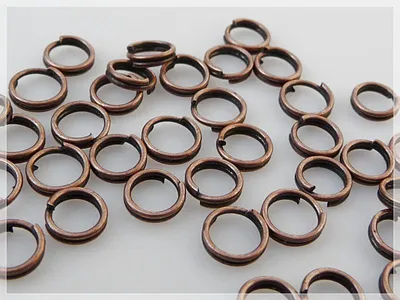 Produktbild von Vintageparts Splitringe doppelt antik kupferfarben rund 6mm Außendurchmesser für Schmuckverschlüsse, 50 Stück