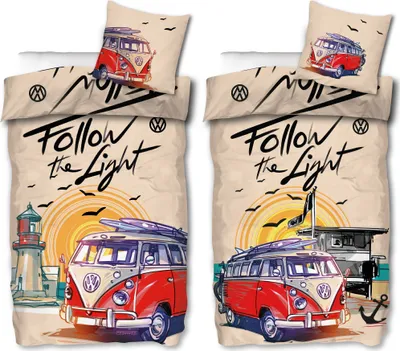 Two identical sets of bedding with a Volkswagen Bulli van design, a lighthouse, and a beach scene.