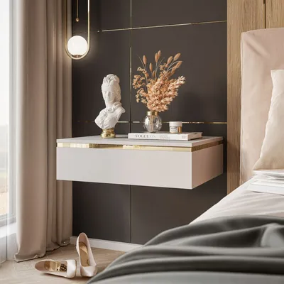 A modern bedroom scene with a floating nightstand, decor, and curtains.