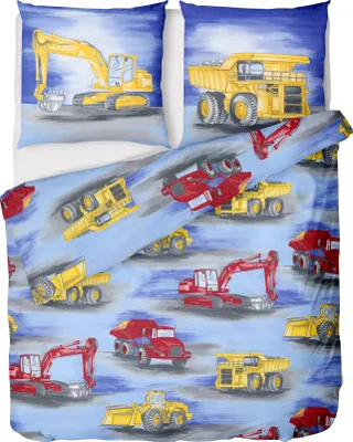 A flat lay of children's bedding with construction vehicle prints.