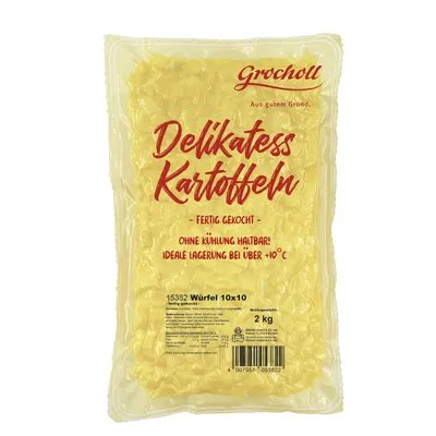 A vacuum-sealed bag of diced potatoes on a white background.