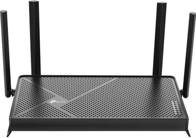 A black TP-LINK router with four antennas is shown against a white background.