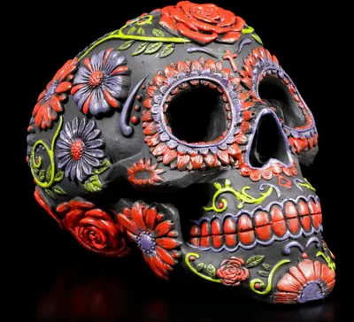 A decorated skull on a black background.