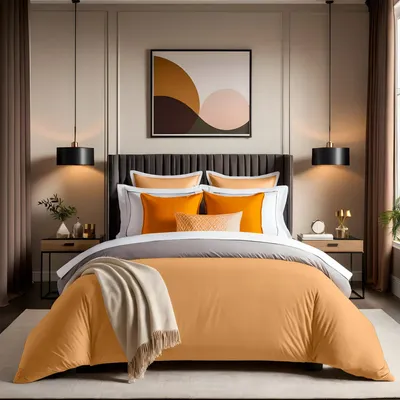 A bedroom scene with a bed made up with orange bedding and a beige throw blanket.