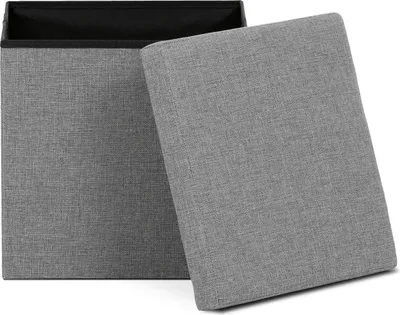 A grey storage ottoman with its lid open, showing the interior.