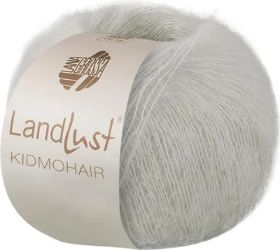 A ball of light gray yarn with a beige label.