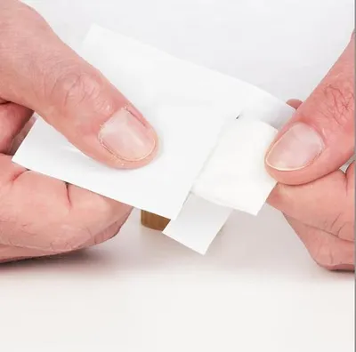 Image de Needit Lite -pysäköintikiekon kiinnitystarrapakkaus