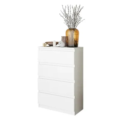 A white chest of drawers with decorative items on top.