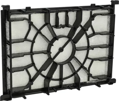 Close-up view of a black plastic filter frame with white filter material.