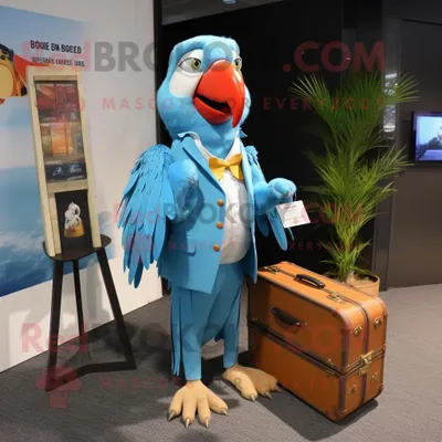 Imagen del producto de Personaje REDBROKOLY de traje de mascota Sky Blue Macaw vestido con una camisa de vestir y maletines