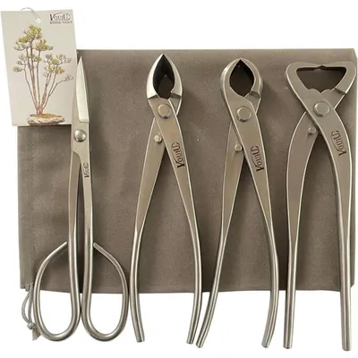 Productafbeelding van Een 4-delige set bonsai-gereedschap, bestaande uit een concave schaar, een knoopschaar, een stamscheider en een bonsai-schaar