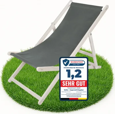 A gray deck chair is placed on a patch of green grass, with a promotional badge to the right.