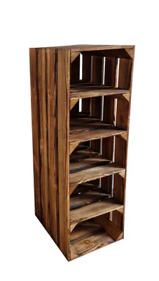 A tall, narrow wooden shelving unit made of stacked crates, displaying five open shelves.