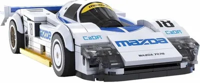 A white and blue model car with racing decals.