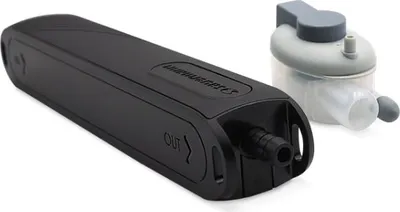 A black pump and a clear and gray accessory are shown against a white background.