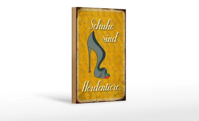 Produktbild von Holzschild Spruch 12x18cm Schuhe sind Herdentiere