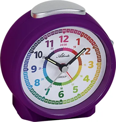 A purple analog alarm clock with a colorful dial.