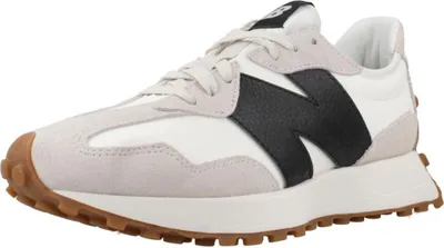 A single New Balance 327 sneaker shown from a side-angle.