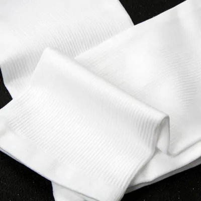 Produktbild von AKIS Sport-Armlinge, Schwarz-Weiß, Unisex, UV-Schutz, kühlend, elastisch, atmungsaktiv, rutschfest, farbecht, pillingresistent, 4 Paare, 85% Polyester, 15% Elasthan, 45g/Paar