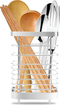 A utensil holder filled with kitchen utensils.
