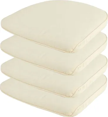 A stack of four cream-colored seat cushions.
