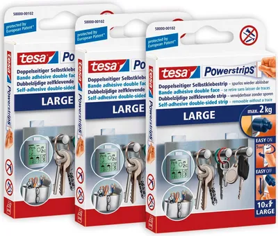 Three boxes of tesa Powerstrips LARGE adhesive strips are displayed side-by-side.