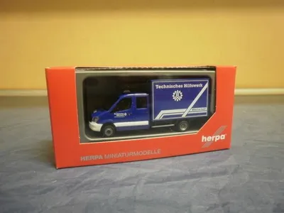Produktbild von Herpa MB Sprinter`13 Doka Kofferaufbau THW 094559