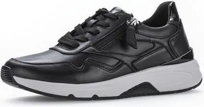 A single black low-top sneaker with a white sole is shown against a white background.