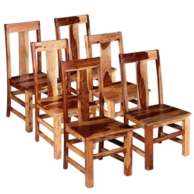 A group of six wooden dining chairs arranged in a staggered formation against a white background.