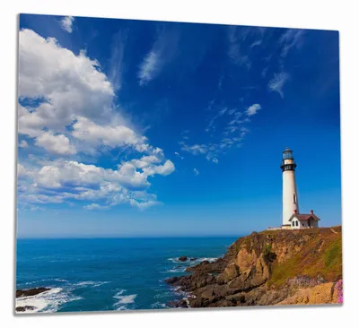 Produktbild von Wallario Herdabdeckplatte aus Glas, Größe 60 x 52 cm 1-teilig, Motiv Leuchtturm auf einem Felsvorsprung - Blauer Himmel