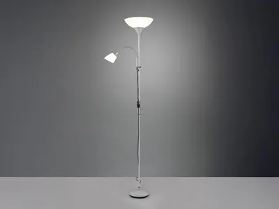 A silver floor lamp with two lights against a gradient gray background.