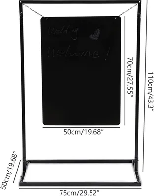 A black metal easel holding a black chalkboard with chalk writing.